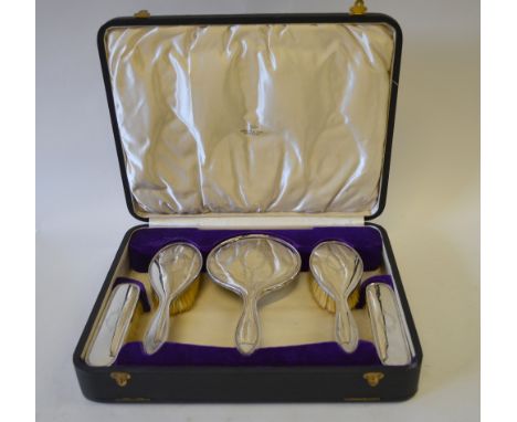 A cased silver five piece brush set with engraved decoration, Walker & Hall, Birmingham 1916 Condition Report Comb missing