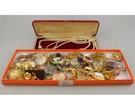 A collection of vintage costume jewellery including two double rows of imitation pearls, single row of imitation pearls and q