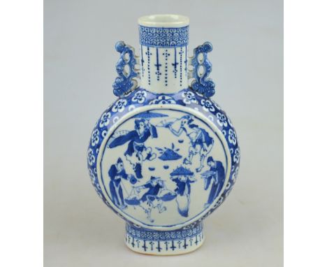 A Chinese 19th century blue and white porcelain moon flask, each face decorated with six artisan figures, 27 cm Condition Rep