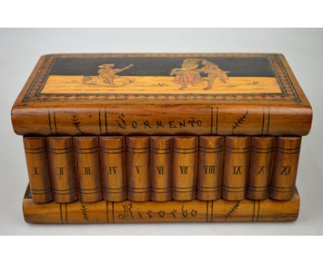 A 19th century Sorrento ware inlaid trinket box in the form of books, the hinged top decorated with dancing rustics, with hid