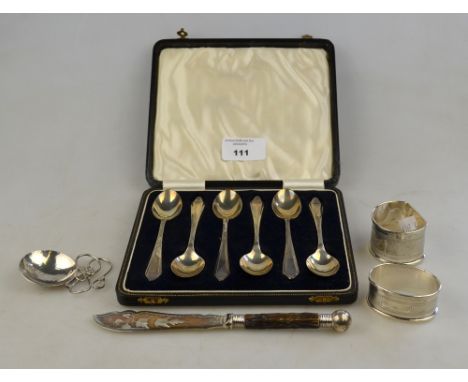 A silver caddy spoon with planished circular bowl and scrolling wire foliate handle, maker VS, Sheffield 1993, to/w a cased s