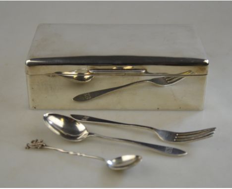 A silver cigarette box with cedar lining, Birmingham 1961 to/w a christening spoon and fork, 1932/33 (spoon a/f), a 'good luc