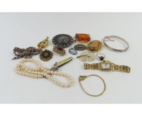 Rotary - a ladies 9ct gold wristwatch, the white rectangular dial with black Roman numerals and hands, on a gate link bracele