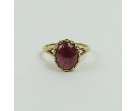 A 9ct gold cabochon cut garnet ring, finger size K, 2.26g gross