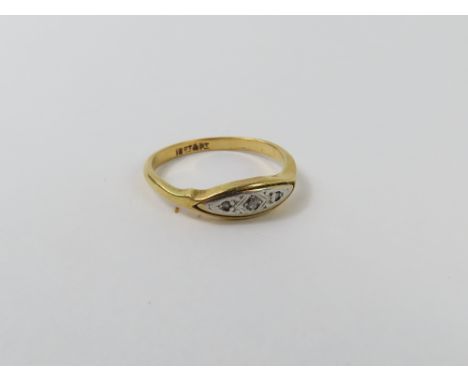 An early 20th century diamond chip set plaque ring, finger size M, marked '18ct pt', 2.21g gross