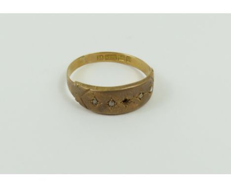 A Victorian 15ct gold ring set with four small rose cut diamonds, finger size Q, 1.9g gross