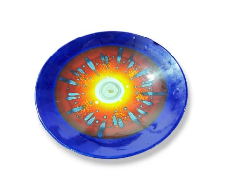 A limited edition Poole Pottery Third Millennium charger, for The Guild of Specialist China and Glass Retailers,  the bright 