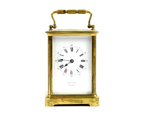 Brass and glass carriage clock by Grouds of Wigan  20cm .    