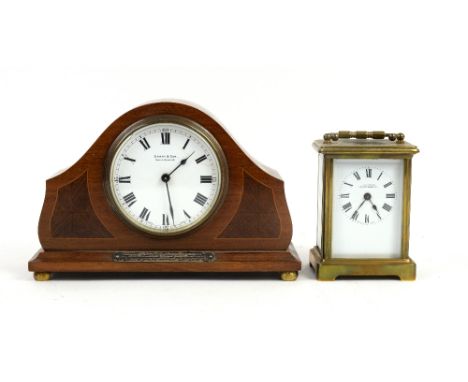 J C Vickery brass and glass carriage clock, 12cm, and a mahogany  mantel clock by Grant and Son 14cm high .    