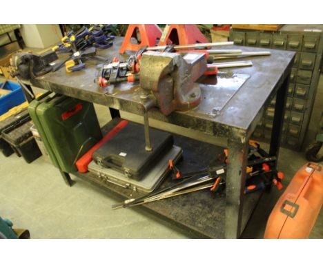 Metal work bench with clamp