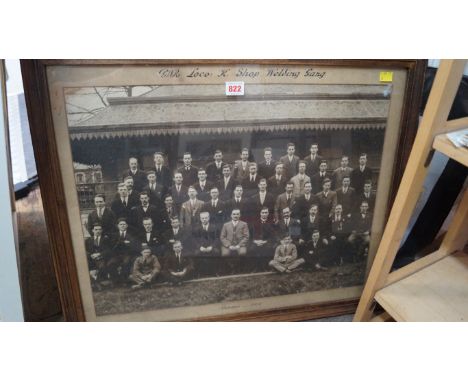 Of railway interest: a black and white photograph of 'GRW Loco: "K" Shop Welding Gang, October 1924', 43.5 x 57cm; together w