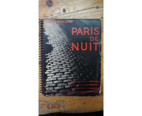MORAND (Paul, 1889-1977): 'Paris de Nuit..'; Paris, Arts et Metiers Graphiques, 1933, illustrated by Brassai. 8vo, spiral-bou