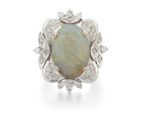 AN OPAL AND DIAMOND CLUSTER RING an oval opal within a floral shaped border set with round brilliant-cut diamonds, to forked 