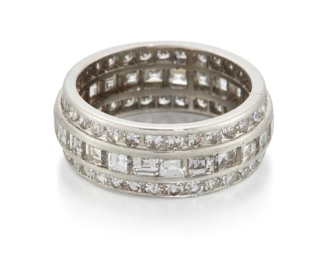 TIFFANY &amp; CO - A DIAMOND ETERNITY RING a band of princess-cut diamonds between bands of eight-cut diamonds. Estimated tot