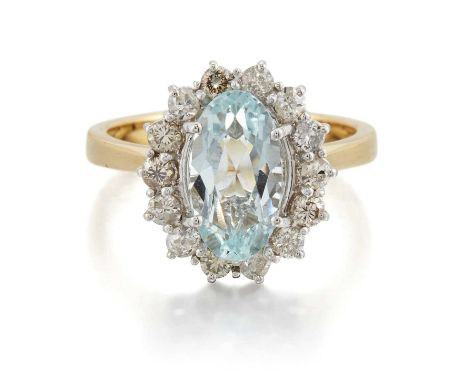 AN 18 CARAT GOLD AQUAMARINE AND DIAMOND CLUSTER RING an oval-cut aquamarine within a border of round-cut diamonds. Estimated 