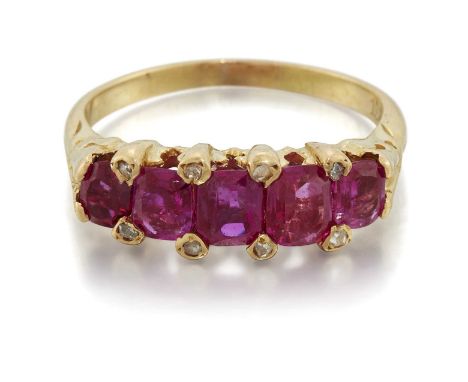 A LATE 19TH CENTURY RUBY AND DIAMOND RING five graduated cushion-cut rubies spaced by diamond accents. Unmarked, ring size M1