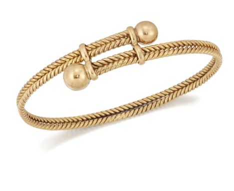 A TORQUE BANGLE two rope pattern bars with ball ends. Unmarked, 7.0cm by 5cm inner diameter, 14mm wide, 25.5 gramsLightly une
