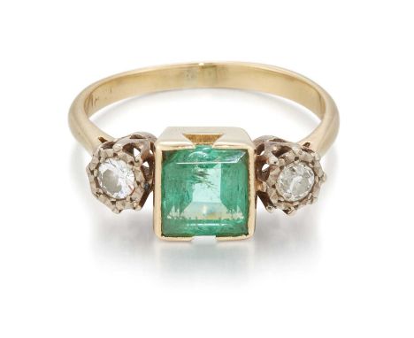 AN EMERALD AND DIAMOND THREE STONE RING an octagonal-cut emerald spaced by illusion-set round brilliant-cut diamonds. Estimat
