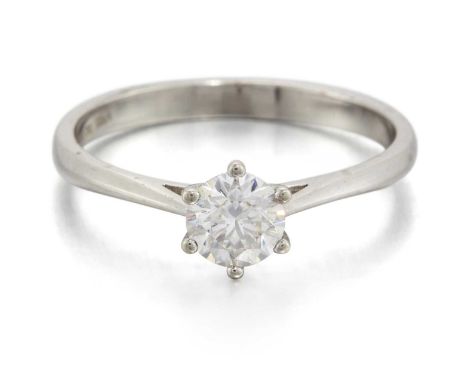 A SOLITAIRE DIAMOND RING a round brilliant-cut diamond in a claw setting. Stated diamond weight 0.50ct, marked 'PT950', ring 