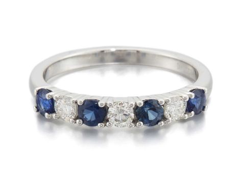 A PLATINUM SAPPHIRE AND DIAMOND HALF HOOP RING round-cut sapphires spaced by round brilliant-cut diamonds. Estimated total di