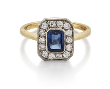 AN 18 CARAT GOLD SAPPHIRE AND DIAMOND CLUSTER RING an octagonal-cut sapphire within an octagonal border of round brilliant-cu