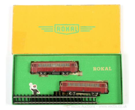 Rokal HO Scale "Schienenbus" (Rail Buses) a pair in maroon and white, includes Power and Non Power Cars and a small quantity 