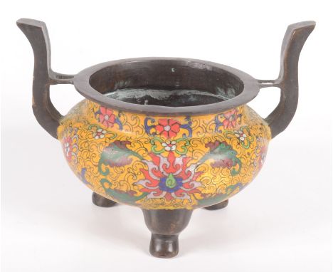 A Chinese bronze and cloisonne censer, four character seal mark to base, height 14cm, width 19.2cm. Condition report: Split t