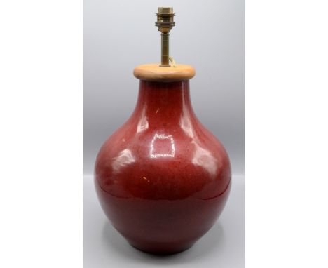 A Chinese red flambe lamp base, of baluster form, total height 41cm. 