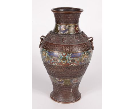 A Japanese bronze vase, 19th century, with three horizontal bands of floral and abstract decoration, height 31cm.