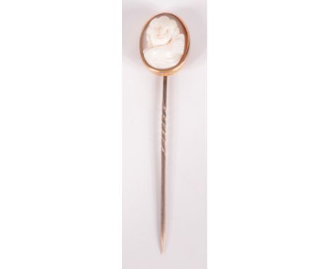 A Victorian gold stick pin, the cameo finial carved with cupids head.