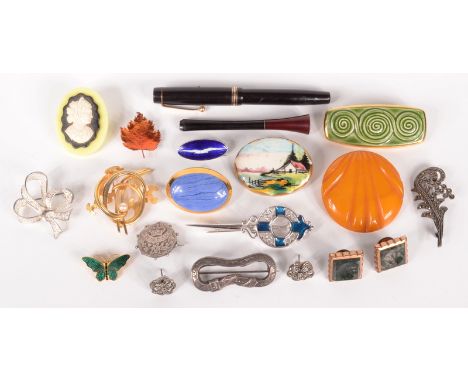 An 'amber' brooch, a Norwegian enamel silver brooch and other brooches etc. 