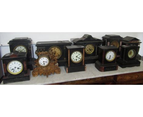 Eight Victorian black slate and marble mantle clocks, an ebonised wooden mantle clock and a gilt metal mantle clock. 