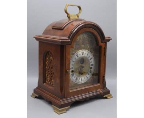 A Dutch Reproduction burr walnut mantel clock, 20th century, with an arched dial signed Christiaan Huygens and German movemen