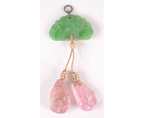 A Chinese carved jade pendant.