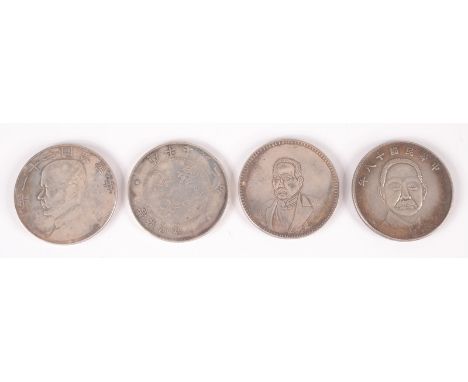 A Chinese silver 1930's dollar Sun Yet Sen type, together with three other Chinese dollar types, possibly counterfeit.