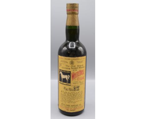 The Old Blend Scotch Whisky of the White Horse Cellar, bottled 1960, no 1119444, 70% proof, height 30cm.