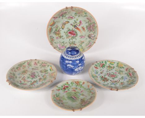 Four Chinese celadon plates, 19th century, blue seal marks, largest diameter 22.3cm and a Chinese porcelain prunus pattern gi