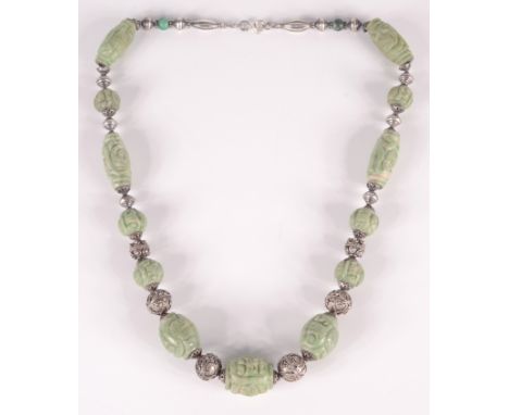 A Chinese carved jade and silver filigree bead necklace. 