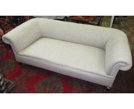 An oatmeal upholstered chesterfield sofa on square section tapering legs.   Condition report:  Very clean, reconditioned. New