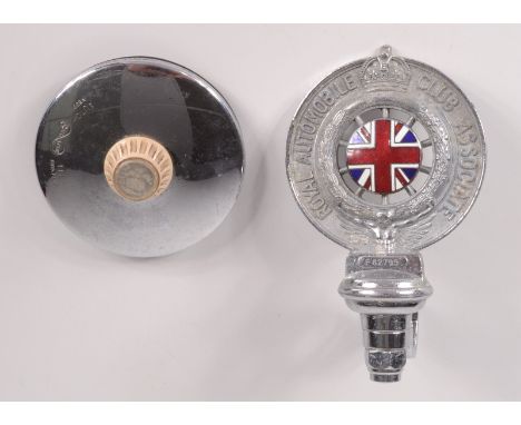 A Royal Automobile Club Associate car badge, No.F82795, 13 x 8cm and a barnacle chrome tax disc holder, diameter 8.2cm.