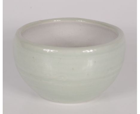 A Leach pottery celadon glaze bowl, height 7.5cm, diameter 12.7cm. Condition report: Leach Pottery mark.  No condition issues