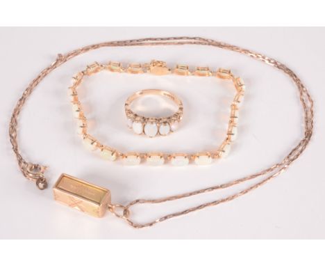 A 14ct gold and opal bracelet, a 9ct gold opal set ring and a gold pendant and chain.