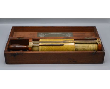 A Fuller's spiral slide rule calculator by W.F. Stanley, London, England, early 20th century, with sliding cylinders and scal