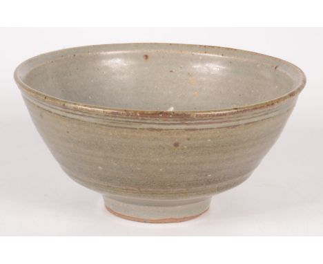 A Trevor Corser Leach pottery footed bowl, celadon glazed, impressed personal and pottery seals, height 6.2cm, diameter 14cm.