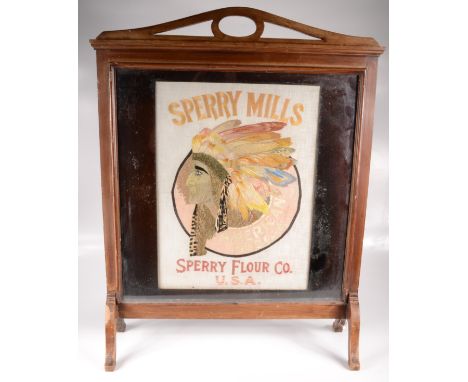 An American WWI food and flour bag, mounted in a mahogany fire screen, silk embroidered with a native American indian and ins