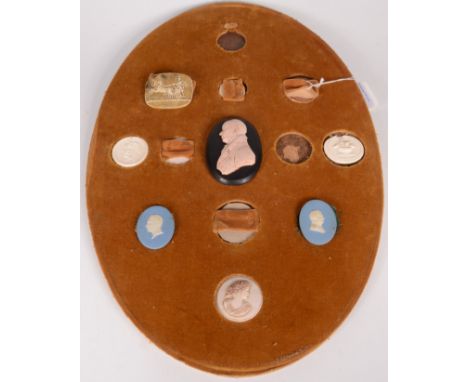 A Thomas Poole pink wax portrait of a gentleman, signed and dated 1812, together with six other cameos in jasper, plaster and