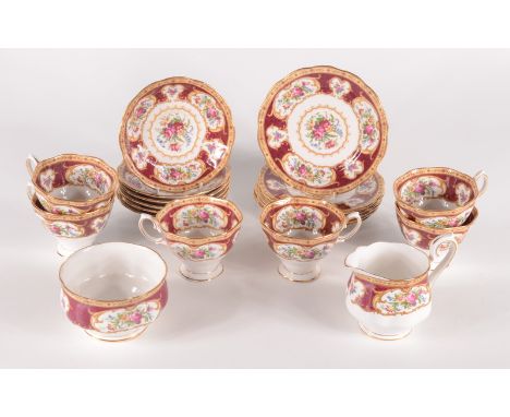 A Royal Albert 'Lady Hamilton' pattern tea service, comprising six cups and saucers, six side plates, a sugar bowl and a milk