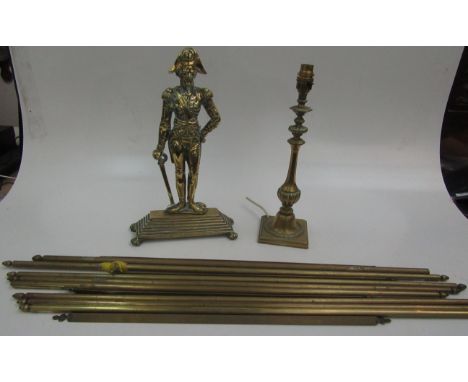 A Victorian brass doorstop, modelled as Napoleon standing on a stepped base on paw feet, height 38.5cm, width 23.5cm, depth 9
