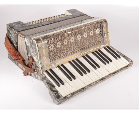 A Bonelli piano accordion, height 39cm, width 46cm, depth 24cm. 