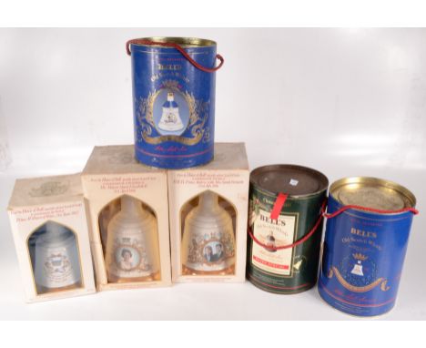 A Royal Decanter Bell's Old Scotch Whisky 1988 Princess Beatrice and another Princess Eugenie, a Christmas 1991 bottle and th